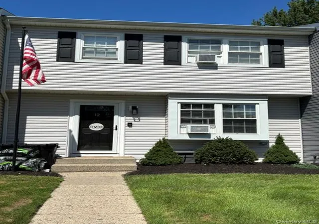 Photo 1 of Single family home for sale at 12 Federal Ln, Brookhaven, NY 11727 | MLS# 1047222 | Listing updated on 2026-09-06