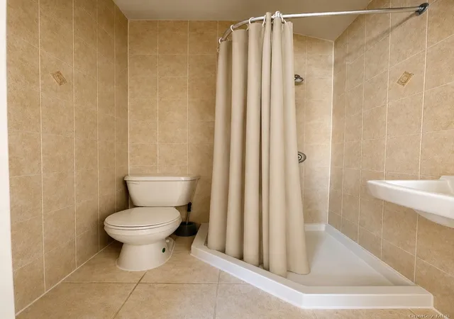 Photo 3 of House for sale at 407 Beach 66th St, New York, NY 11692 | MLS# 1047364 | Listing updated on 2026-09-06