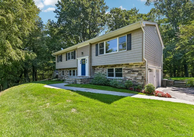 Photo 2 of Single family home for sale at 56 Sandy Holw Rd, Huntington, NY 11768 | MLS# 1047508 | Listing updated on 2026-09-28