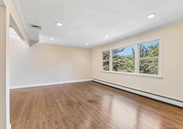 Photo 3 of Single family home for sale at 56 Sandy Holw Rd, Huntington, NY 11768 | MLS# 1047508 | Listing updated on 2026-09-28