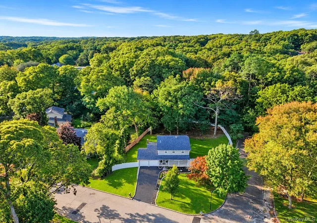 Photo 2 of Single family home for sale at 102 Patchogue Dr, Brookhaven, NY 11778 | MLS# 1047693 | Listing updated on 2026-10-04