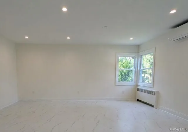 Photo 3 of Single family home for sale at 11 Wood St, Hempstead, NY 11563 | MLS# 1047701 | Listing updated on 2026-10-02