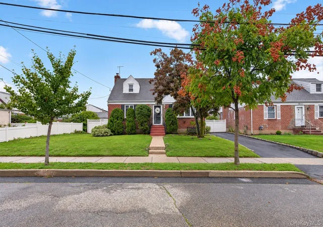 Photo 2 of Single family home for sale at 11 White St, Hempstead, NY 11580 | MLS# 1047761 | Listing updated on 2026-09-16