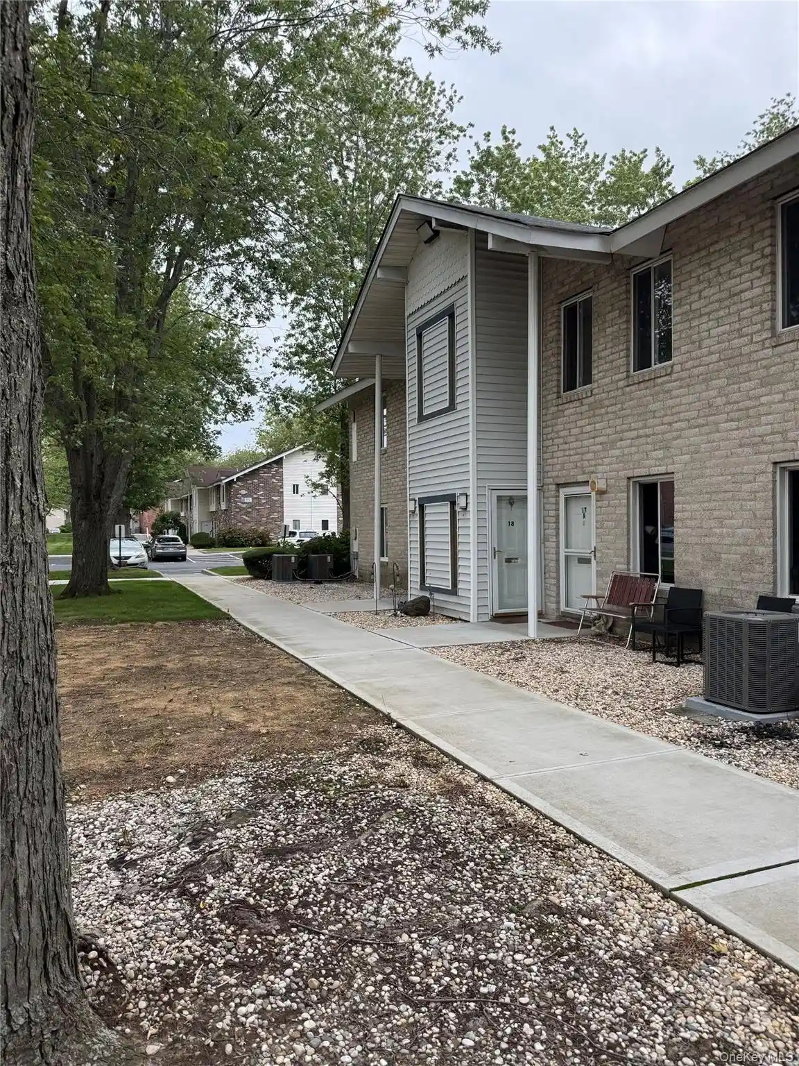 Listing Photo 1 - Condo for sale in 18 Redwood Ct located at 18 Redwood Ct, Brookhaven, NY 11727 - Unit #18