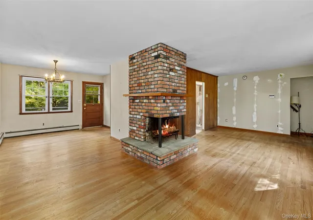 Photo 2 of Sale Pending at 11 Woodycrest Dr, Huntington, NY 11768 | MLS# 1048005 | Listing updated on 2026-09-22