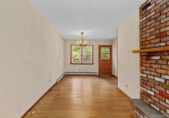 Photo 3 of Sale Pending at 11 Woodycrest Dr, Huntington, NY 11768 | MLS# 1048005 | Listing updated on 2026-09-22