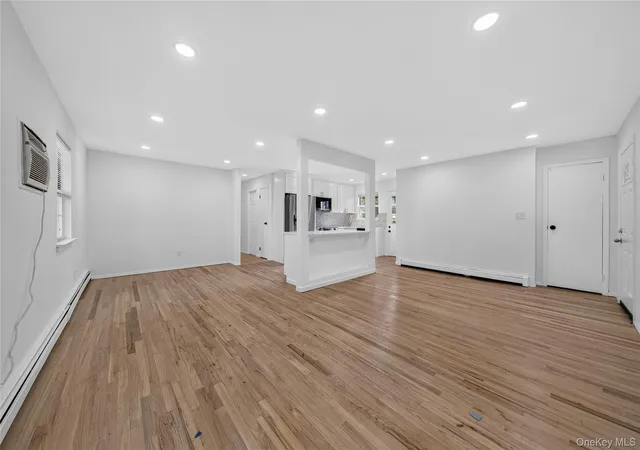 Photo 4 of Single family home for sale at 28 Roslyn Ave, Brookhaven, NY 11784 | MLS# 1048110 | Listing updated on 2026-09-26