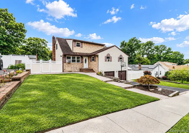 Photo 2 of Single family home for sale at 12 Carston St, Brookhaven, NY 11784 | MLS# 1048125 | Listing updated on 2026-09-26