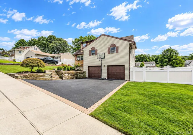 Photo 3 of Single family home for sale at 12 Carston St, Brookhaven, NY 11784 | MLS# 1048125 | Listing updated on 2026-09-26