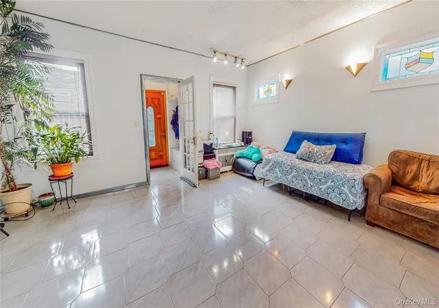 Photo 2 of Single family home for sale at 64-53 82nd Place, New York, NY 11379 | MLS# 1048228 | Listing updated on 2026-10-28