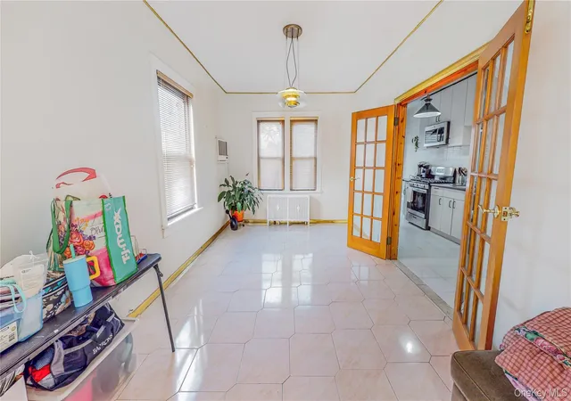 Photo 4 of Single family home for sale at 64-53 82nd Place, New York, NY 11379 | MLS# 1048228 | Listing updated on 2026-10-28