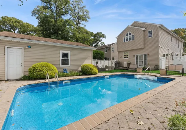 Photo 2 of Single family home for sale at 122 Commonwealth Ave, Hempstead, NY 11566 | MLS# 1048375 | Listing updated on 2026-10-08