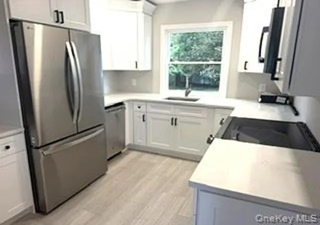 Photo 3 of Sale Pending at 60 Howard Ave, Babylon, NY 11726 | MLS# 1048486 | Listing updated on 2026-09-26