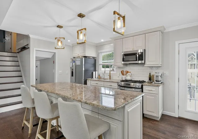 Photo 3 of Sale Pending at 61 Carleton Ave, Babylon, NY 11701 | MLS# 1048520 | Listing updated on 2026-10-03