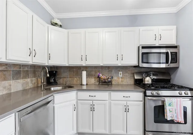 Photo 3 of Sale Pending at 2 Hemlock Ct #2, Brookhaven, NY 11784 | MLS# 1048532 | Listing updated on 2026-09-23