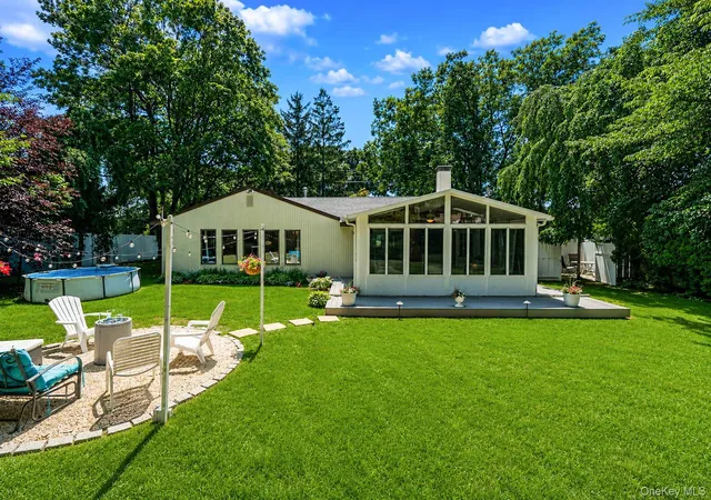 Photo 4 of Single family home for sale at 1011 Old Town Rd, Brookhaven, NY 11727 | MLS# 1048902 | Listing updated on 2026-09-30
