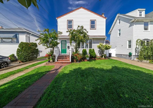 Photo 2 of Single family home for sale at 48 W Windsor Pkwy, Hempstead, NY 11572 | MLS# 1049001 | Listing updated on 2026-09-29