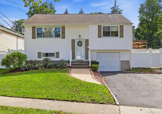 Photo 1 of Single family home for sale at 8 Ripley Dr, Huntington, NY 11768 | MLS# 1049151 | Listing updated on 2026-09-25