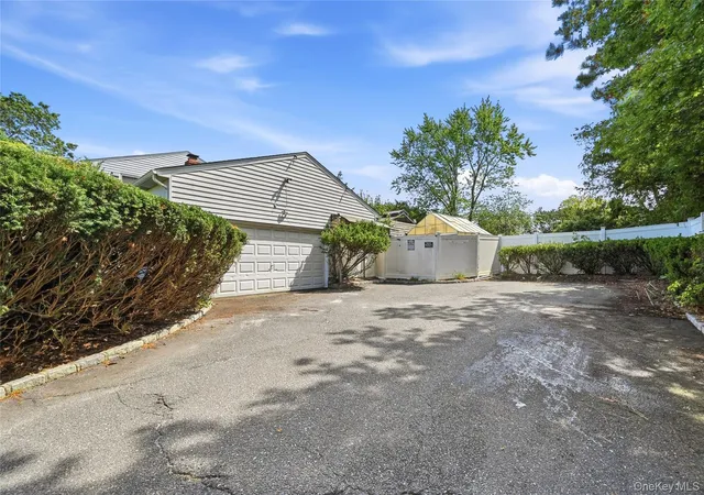Photo 2 of Single family home for sale at 124 E Woodside Ave, Brookhaven, NY 11772 | MLS# 1049297 | Listing updated on 2026-09-13