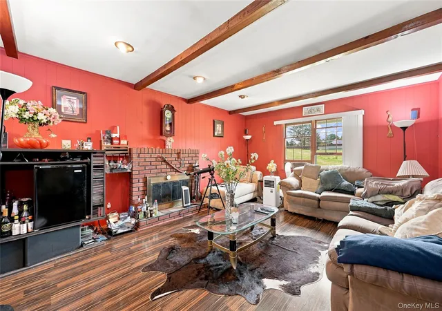 Photo 3 of Single family home for sale at 124 E Woodside Ave, Brookhaven, NY 11772 | MLS# 1049297 | Listing updated on 2026-09-13