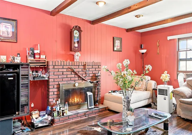Photo 3 of Single family home for sale at 124 E Woodside Ave, Brookhaven, NY 11772 | MLS# 1049297 | Listing updated on 2026-09-13