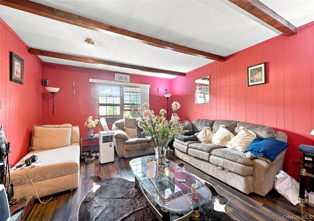 Photo 4 of Single family home for sale at 124 E Woodside Ave, Brookhaven, NY 11772 | MLS# 1049297 | Listing updated on 2026-09-13