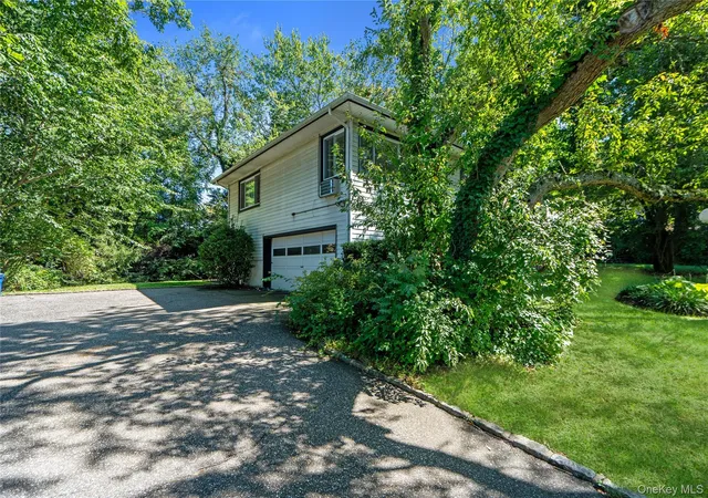 Photo 2 of Single family home for sale at 58 Ridge Dr E, North Hempstead, NY 11576 | MLS# 1049402 | Listing updated on 2026-09-27