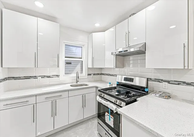 Photo 2 of Multi family home for sale at 8402 Smedley St, New York, NY 11435 | MLS# 1049423 | Listing updated on 2026-09-12