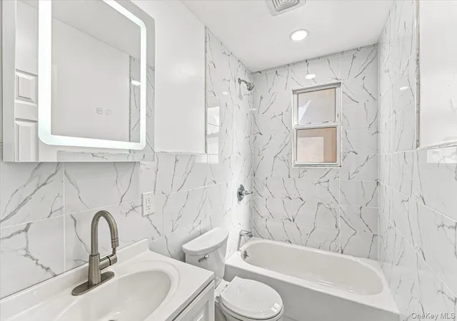 Photo 3 of Multi family home for sale at 8402 Smedley St, New York, NY 11435 | MLS# 1049423 | Listing updated on 2026-09-12