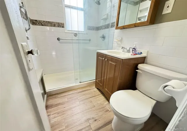 Photo 2 of Multi family home for sale at 7036 65th Street, New York, NY 11385 | MLS# 1049508 | Listing updated on 2026-10-08