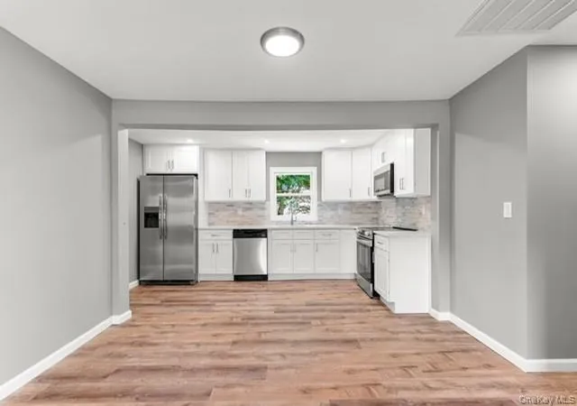 Photo 4 of Single family home for sale at 1340 Manor Ln, Islip, NY 11706 | MLS# 1049627 | Listing updated on 2026-09-27