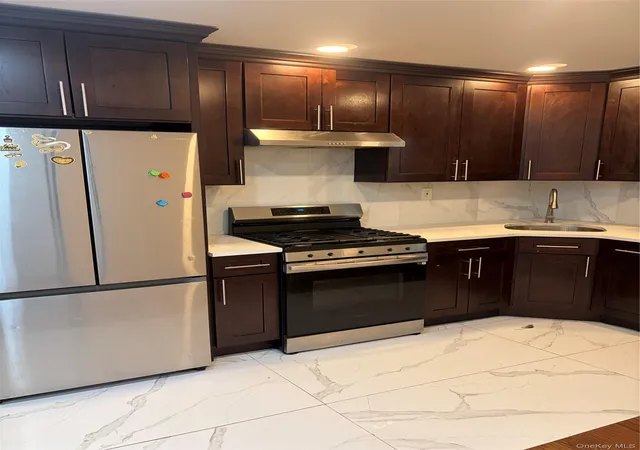 Photo 2 of Multi family home for sale at 5926 Grove St, New York, NY 11385 | MLS# 1049851 | Listing updated on 2026-10-08