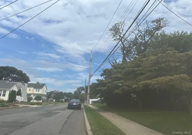 Photo 4 of Single family home for sale at 76 Driving Park Ave, Hempstead, NY 11563 | MLS# 1049856 | Listing updated on 2026-09-12