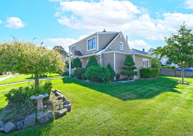 Photo 2 of Single family home for sale at 2 Cooper Ln, Hempstead, NY 11756 | MLS# 1050095 | Listing updated on 2026-09-18