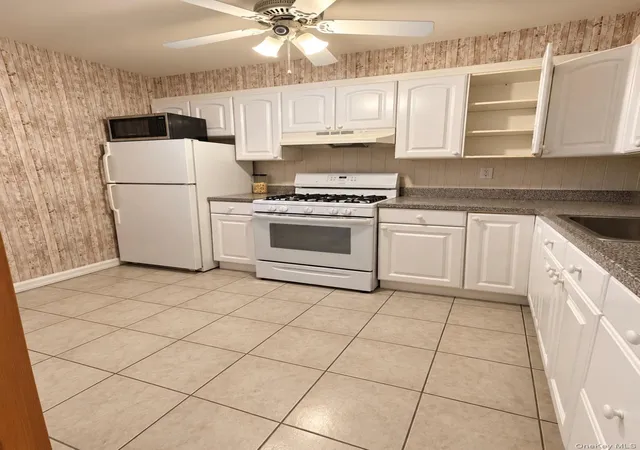 Photo 3 of Multi family home for sale at 6962 Grand Ave, New York, NY 11378 | MLS# 1050154 | Listing updated on 2026-09-14