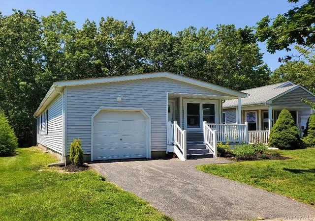 Photo 1 of Condo for sale at 201 Village Cir W, Brookhaven, NY 11949 | MLS# 1050162 | Listing updated on 2026-09-15