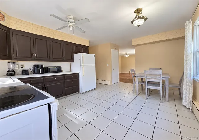 Photo 2 of Single family home for sale at 80 Carroll Ave, Brookhaven, NY 11779 | MLS# 1050359 | Listing updated on 2026-09-15