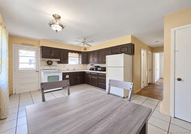 Photo 3 of Single family home for sale at 80 Carroll Ave, Brookhaven, NY 11779 | MLS# 1050359 | Listing updated on 2026-09-15