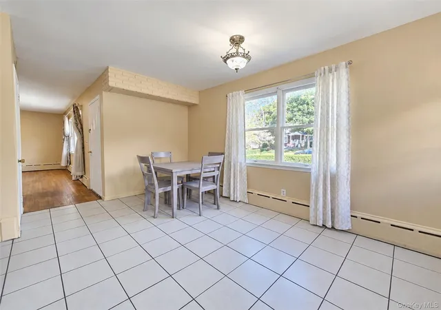 Photo 4 of Single family home for sale at 80 Carroll Ave, Brookhaven, NY 11779 | MLS# 1050359 | Listing updated on 2026-09-15