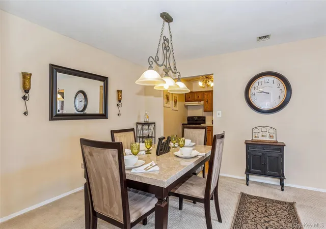 Photo 2 of Condo for sale at 6 Cambridge Dr W, Babylon, NY 11726 | MLS# 1050820 | Listing updated on 2026-09-16