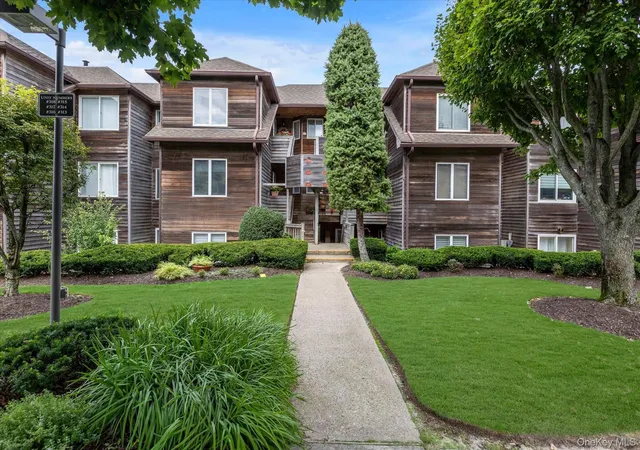 Listing Photo 1 - Condo for sale in building located at 318 Fox Hl Dr, Riverhead, NY 11933