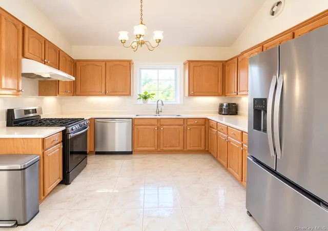 Photo 3 of House for sale at 69-29 53rd Drive, New York, NY 11378 | MLS# 1051066 | Listing updated on 2026-09-16