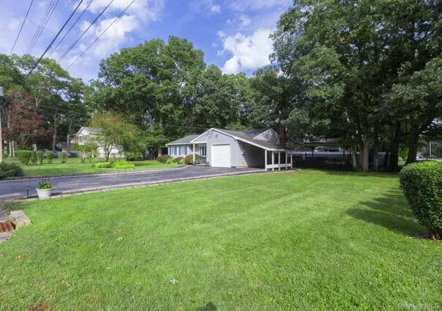 Photo 2 of Single family home for sale at 21 Aberdeen Dr, Mastic, NY 11950 | MLS# 1051490 | Listing updated on 2026-10-07