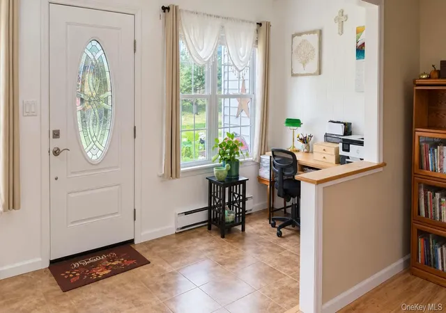 Photo 3 of Condo for sale at 395 Woodbridge Dr #E, Brookhaven, NY 11961 | MLS# 1051844 | Listing updated on 2026-09-24