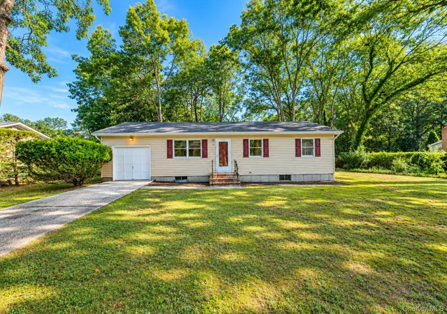 Photo 3 of Single family home for sale at 50 Fanning Blvd, Riverhead, NY 11901 | MLS# 1052051 | Listing updated on 2026-09-21