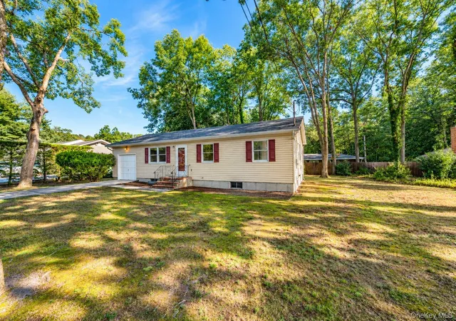 Photo 4 of Single family home for sale at 50 Fanning Blvd, Riverhead, NY 11901 | MLS# 1052051 | Listing updated on 2026-09-21