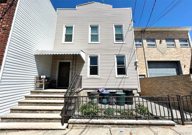 Photo 1 of House for sale at 59-51 56th Drive, New York, NY 11378 | MLS# 1052575 | Listing updated on 2026-09-18