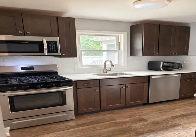 Photo 3 of Single family home for sale at 8 Canary Pl, Farmingville, NY 11738 | MLS# 1052589 | Listing updated on 2026-10-09