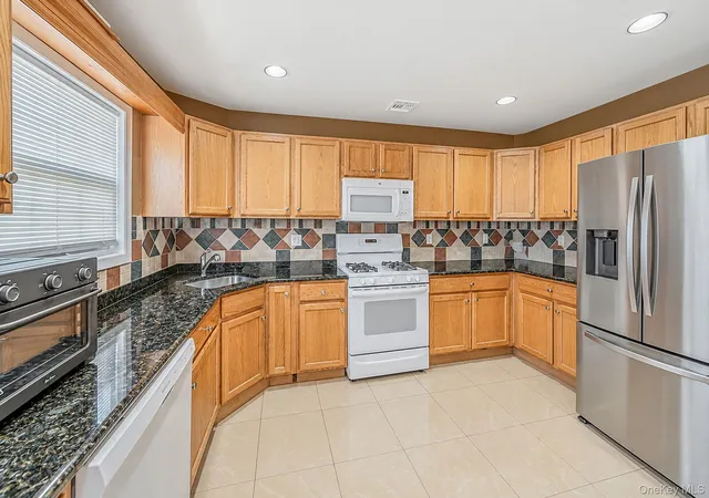Photo 3 of Single family home for sale at 19 Oceanview Blvd, Brookhaven, NY 11949 | MLS# 1052595 | Listing updated on 2026-09-23