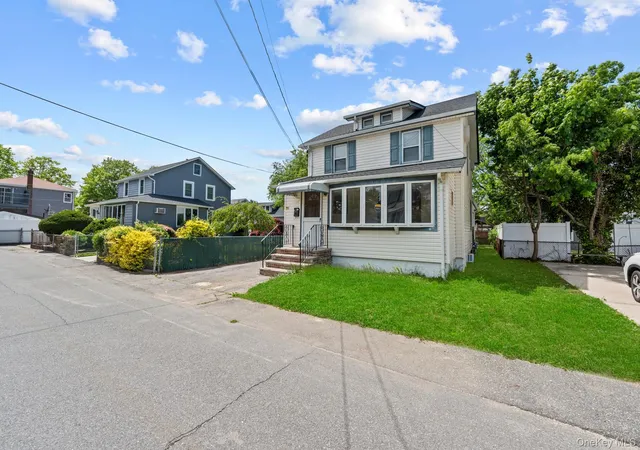 Photo 13 of Single family home for sale at 1 Lewis Pl, Hempstead, NY 11563 | MLS# 1052811 | Listing updated on 2026-10-05